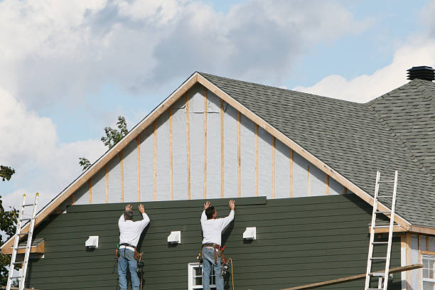 Professional Siding technician working in McLeansville, NC